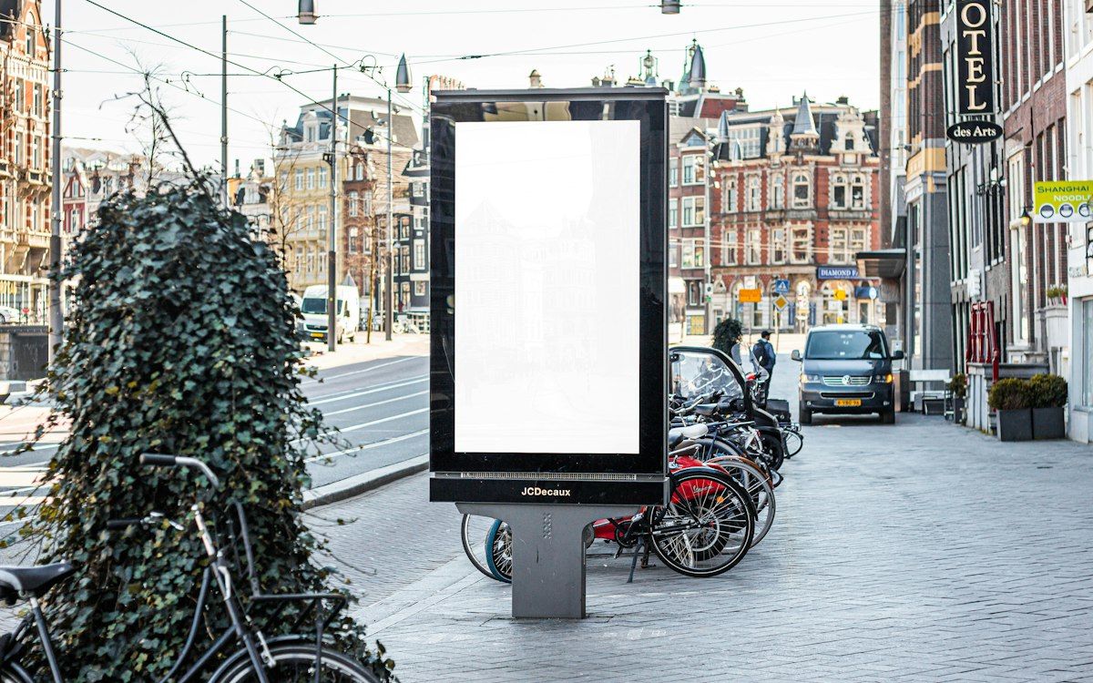 Blank digital billboard on a city sidewalk